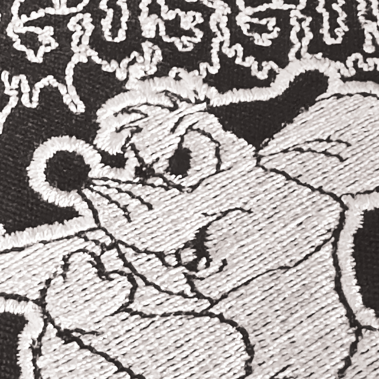 Death metal-inspired Gus Gus iron-on patch featuring a dark, heavy metal twist on the beloved Cinderella mouse.