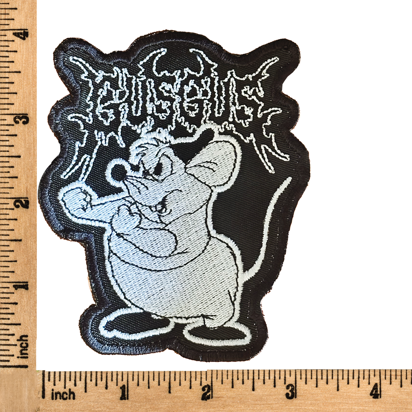 Death metal-inspired Gus Gus iron-on patch featuring a dark, heavy metal twist on the beloved Cinderella mouse.