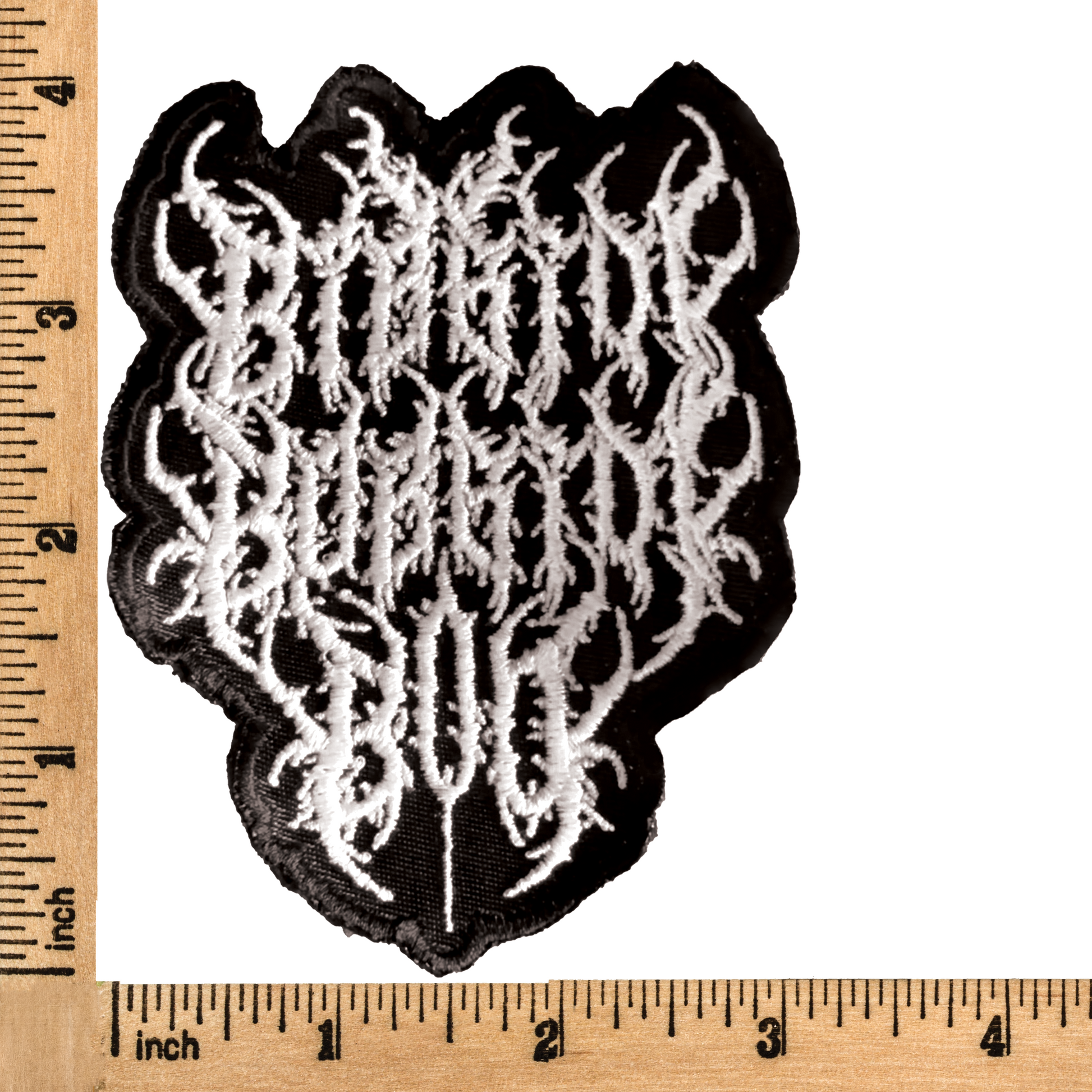 Death metal-inspired 'Bibbidi Bobbidi Boo' iron-on patch featuring a dark, heavy metal twist on the classic Cinderella spell.